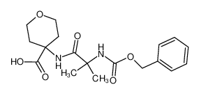 4-(2-Benzyloxycarbonylamino-2-methyl-propionylamino)-tetrahydro-pyran-4-carboxylic acid_195503-54-9
