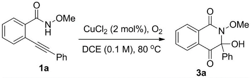 Specific reaction scheme converting N-methoxy-2-phenylethynylbenzamide to the target isoquinoline dione