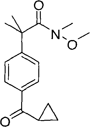 Chemical structure of N-methyl-N-methoxy-2-(4-cyclopropylcarbonylphenyl)-2-methylpropanamide showing the Weinreb amide and cyclopropyl ketone moieties