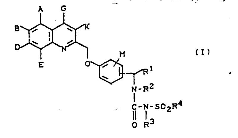 Reaction scheme showing the coupling of amine formula II with sulfonyl isocyanate formula III to form compound Ia