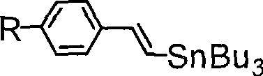 Chemical structure of the key reactant (E)-beta-tributyltin p-R-styrene used in the coupling reaction