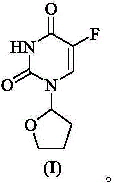 Chemical structure of Tegafur (Formula I) showing the 1-(tetrahydro-2-furyl)-5-fluoro-2,4(1H,3H)-pyrimidinedione core