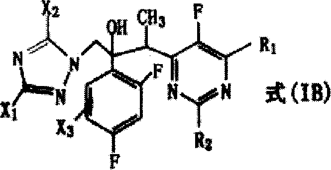 Reduction reaction converting Formula IA to Formula IB via catalytic hydrogenolysis
